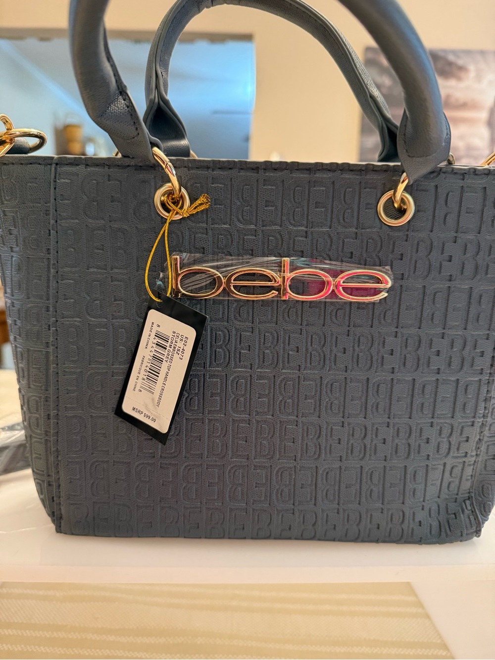 bebe Embossed Logo Tote in Slate Blue with Gold Hardware